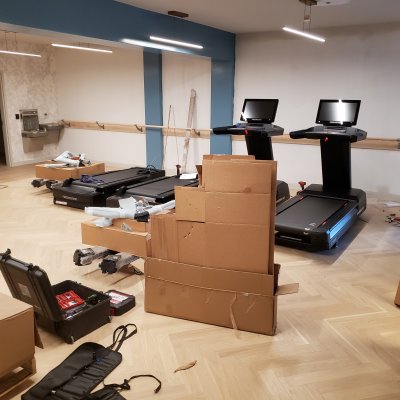 Unpacking and unloading gym equipment